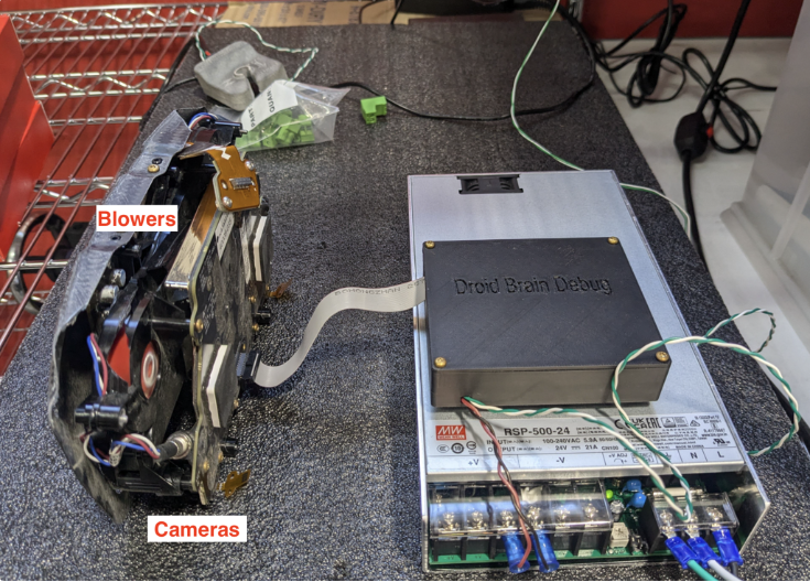 Droid brain installed in the test setup, with blowers and cameras labeled